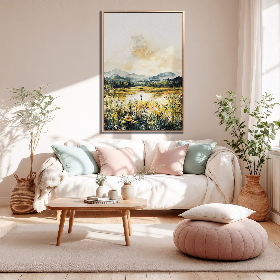 Framed Wall Art: Watercolor landscape print in warm yellow, green, and blue tones. Adds a touch of nature and tranquility to any living room.