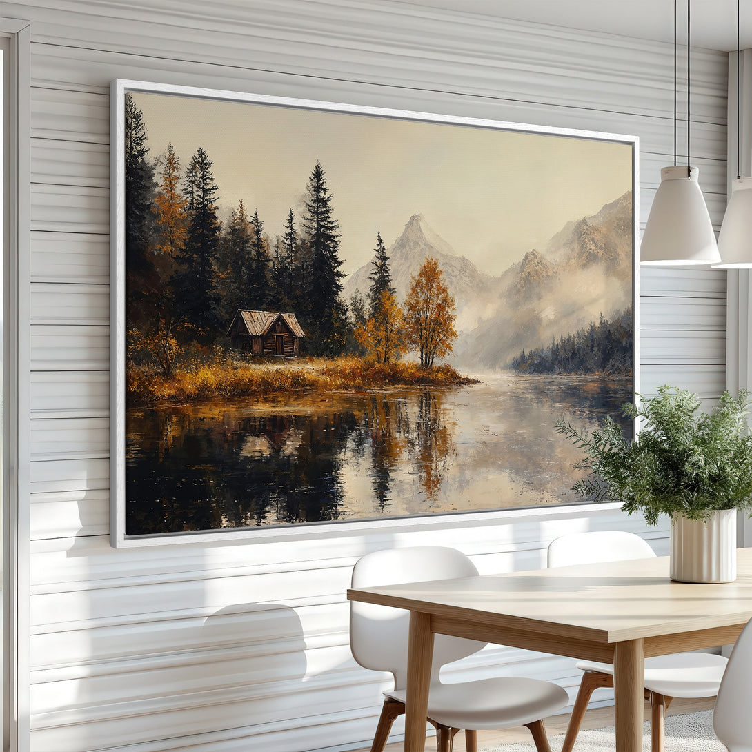 Framed Wall Art featuring a serene landscape with a cabin, lake, and mountains. Warm autumn color palette creates a cozy and inviting atmosphere.