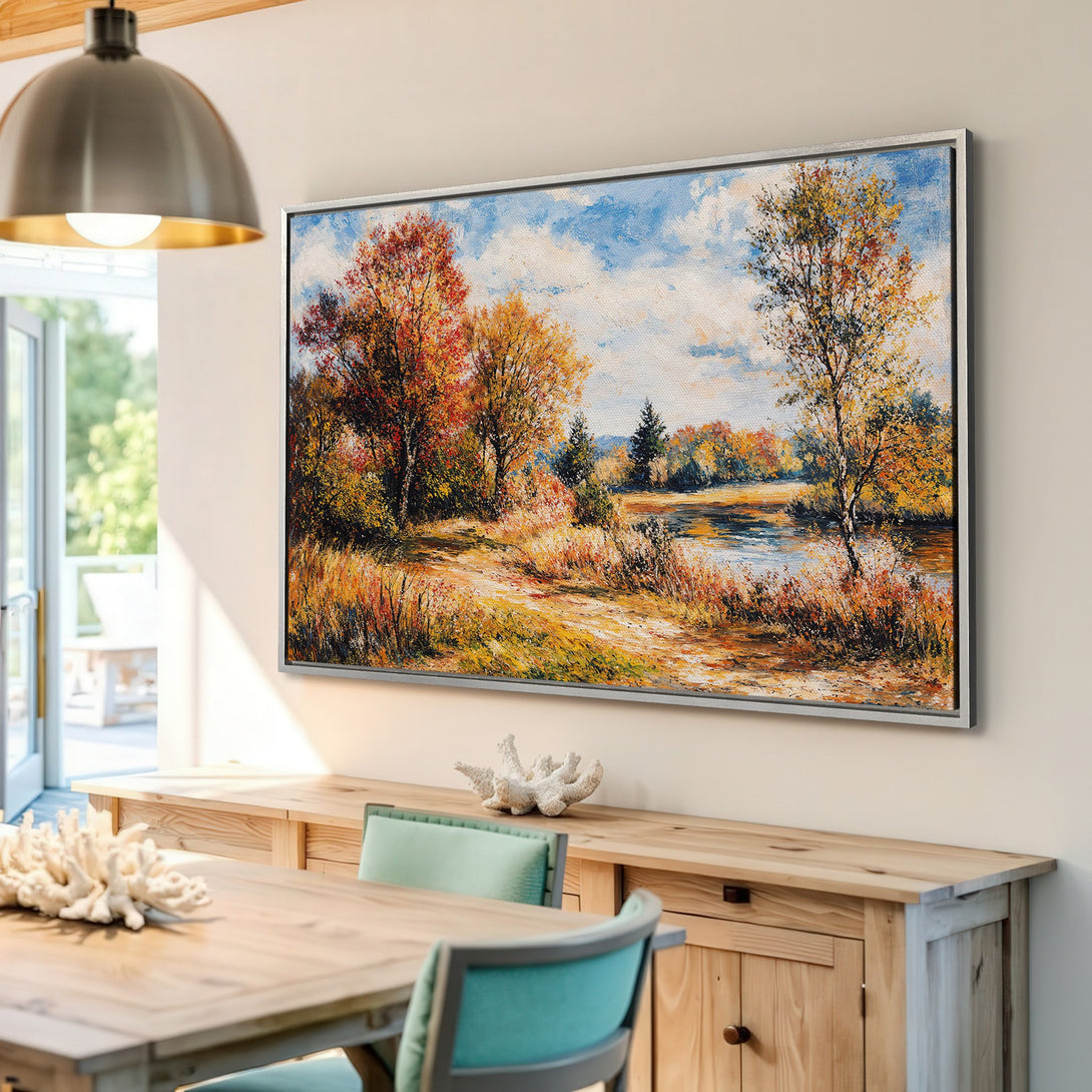 Framed Wall Art of a vibrant autumn landscape. Impressionistic style with warm, earthy tones of red, orange, and yellow. Perfect for adding cozy vibes to any room.