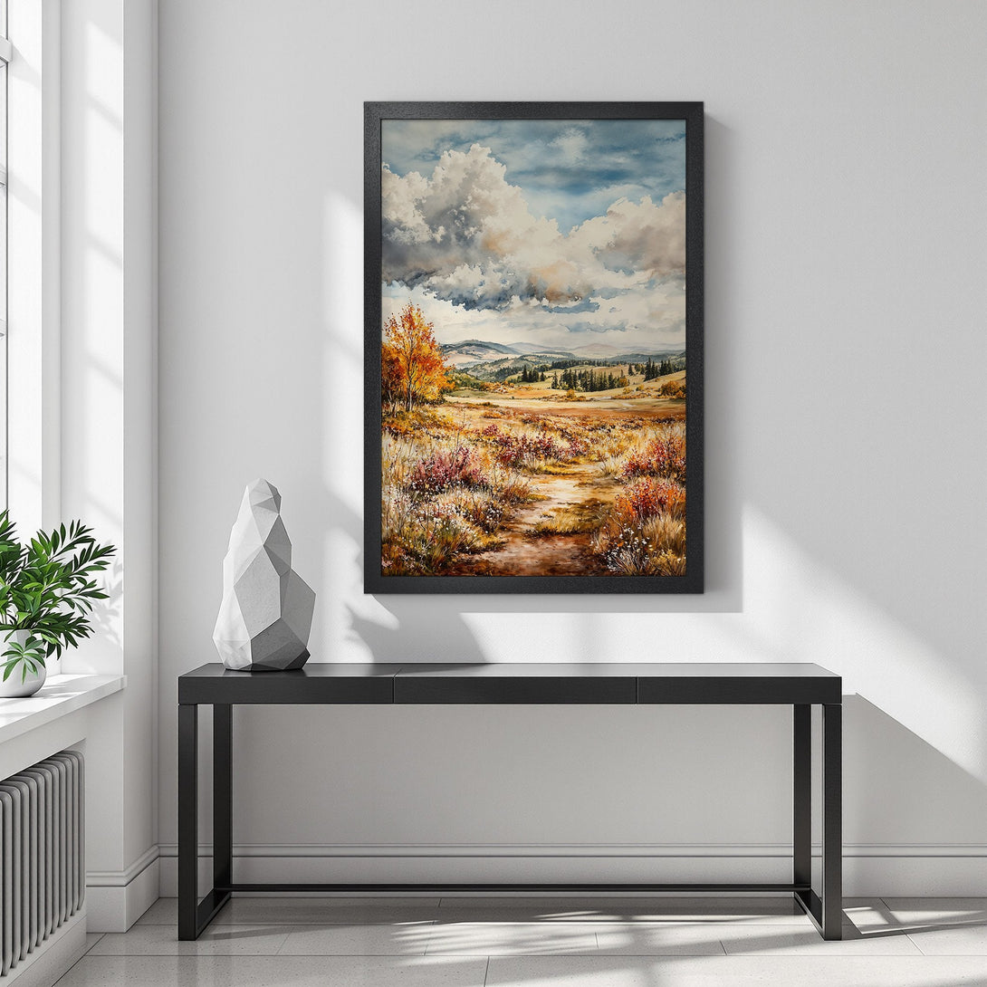 Framed Poster of a serene landscape painting with warm autumn colors and a cloudy sky. Perfect wall art for home decor.