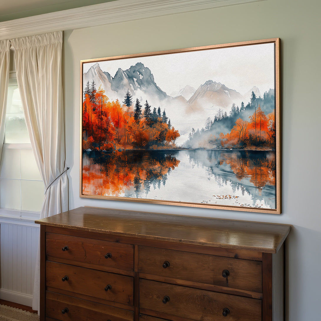 Framed Wall Art: Watercolor landscape Canvas Print with mountains, trees, and lake in warm orange, blue, and gray tones. Perfect for home decor!