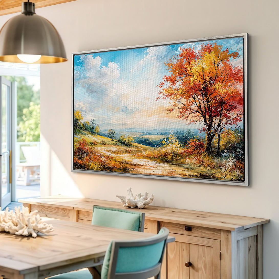 Framed Wall Art: Autumn landscape canvas print with vibrant orange and yellow trees. Adds warmth and style to any interior.