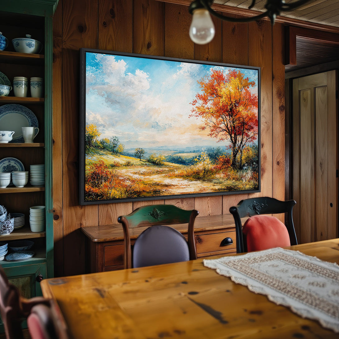 Framed Wall Art: Autumn landscape canvas print with warm orange, yellow, and blue tones. Perfect for adding a touch of nature to your home decor.