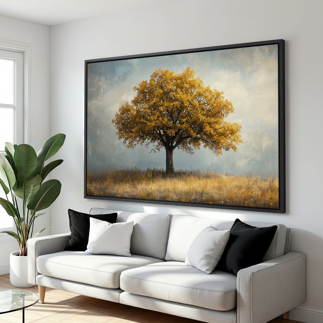 Framed Wall Art: Majestic tree canvas print in warm gold and blue tones. Perfect for adding a touch of nature and elegance to your living room decor.