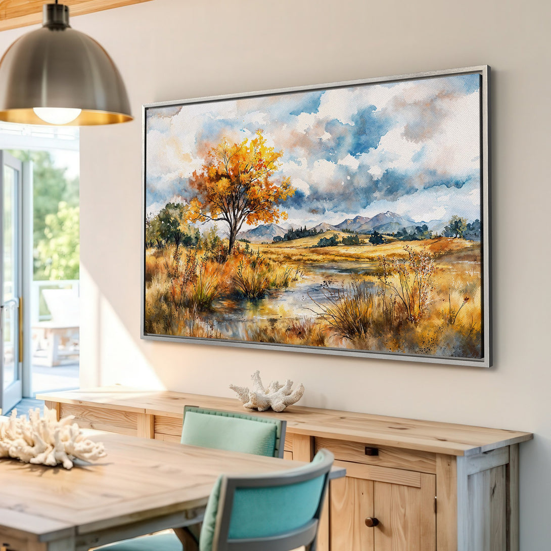 Framed Wall Art: Watercolor landscape Canvas Print with warm yellow, blue, and brown tones. Adds a touch of nature to any room.