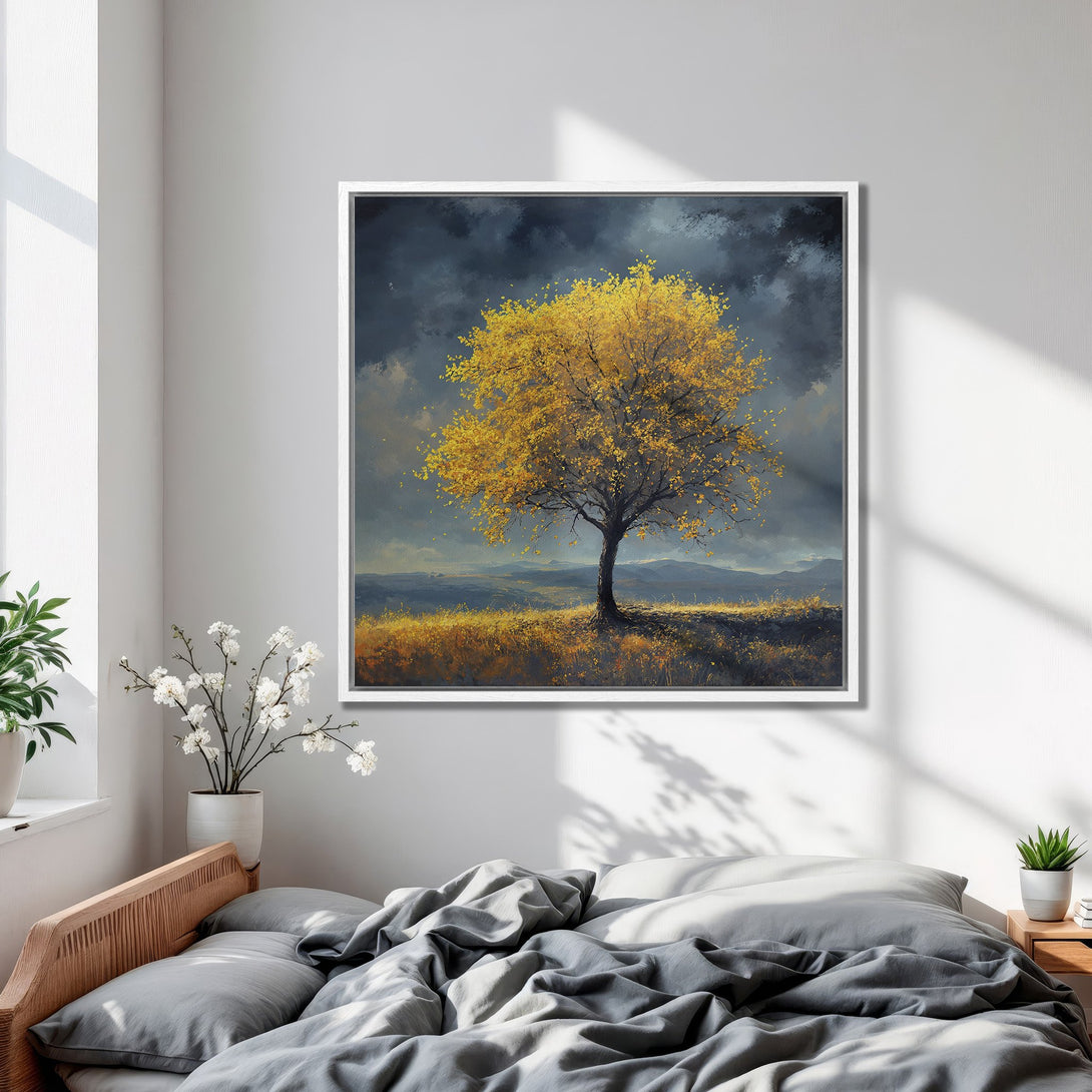 Framed Wall Art: Majestic tree painting with golden leaves against a moody sky. Earthy tones of yellow, blue, and brown create a serene, artistic vibe.