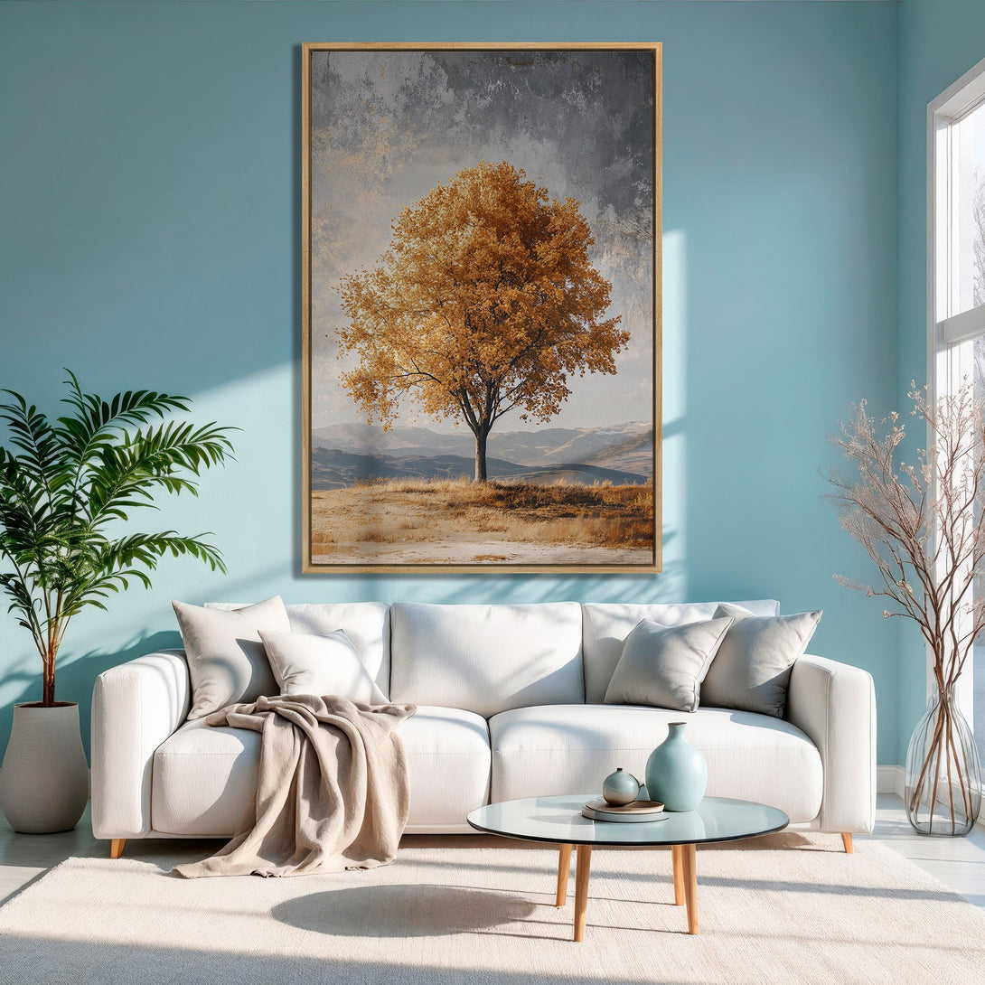 Framed Wall Art: Golden tree canvas print in a modern living room. Warm, earthy tones with a touch of blue create a calming, inviting space.