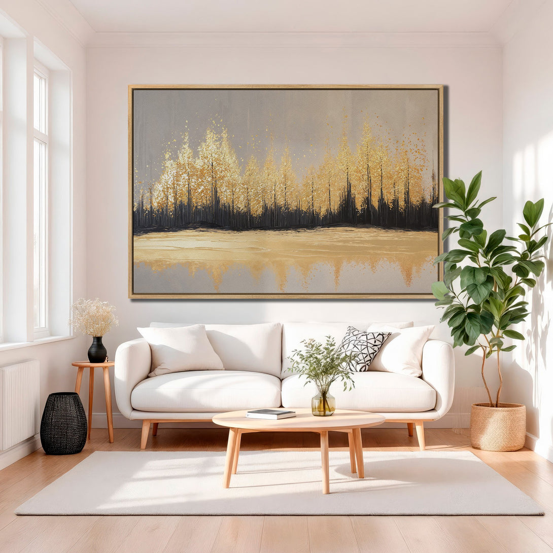 Framed Wall Art: Gold foil trees painting in a modern living room. Neutral color palette with gold accents. Perfect for adding elegance to your space.