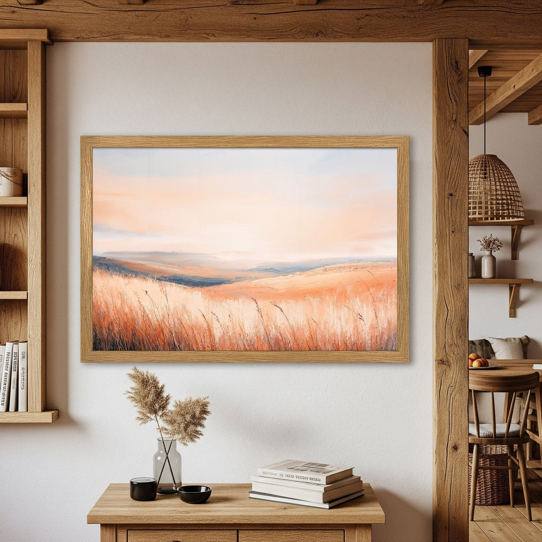 Framed Poster of a serene landscape, featuring wheat fields in warm orange and blue hues. Perfect wall art for a cozy home.