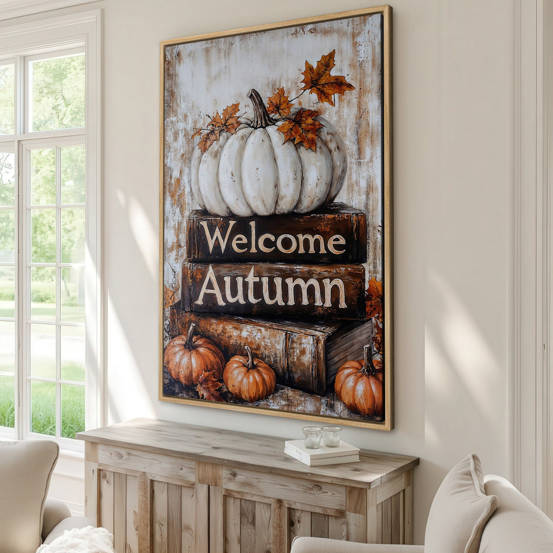 Framed Wall Art: "Welcome Autumn" pumpkin print in warm orange and white tones, perfect for fall decor. Rustic style canvas print for cozy home interiors.