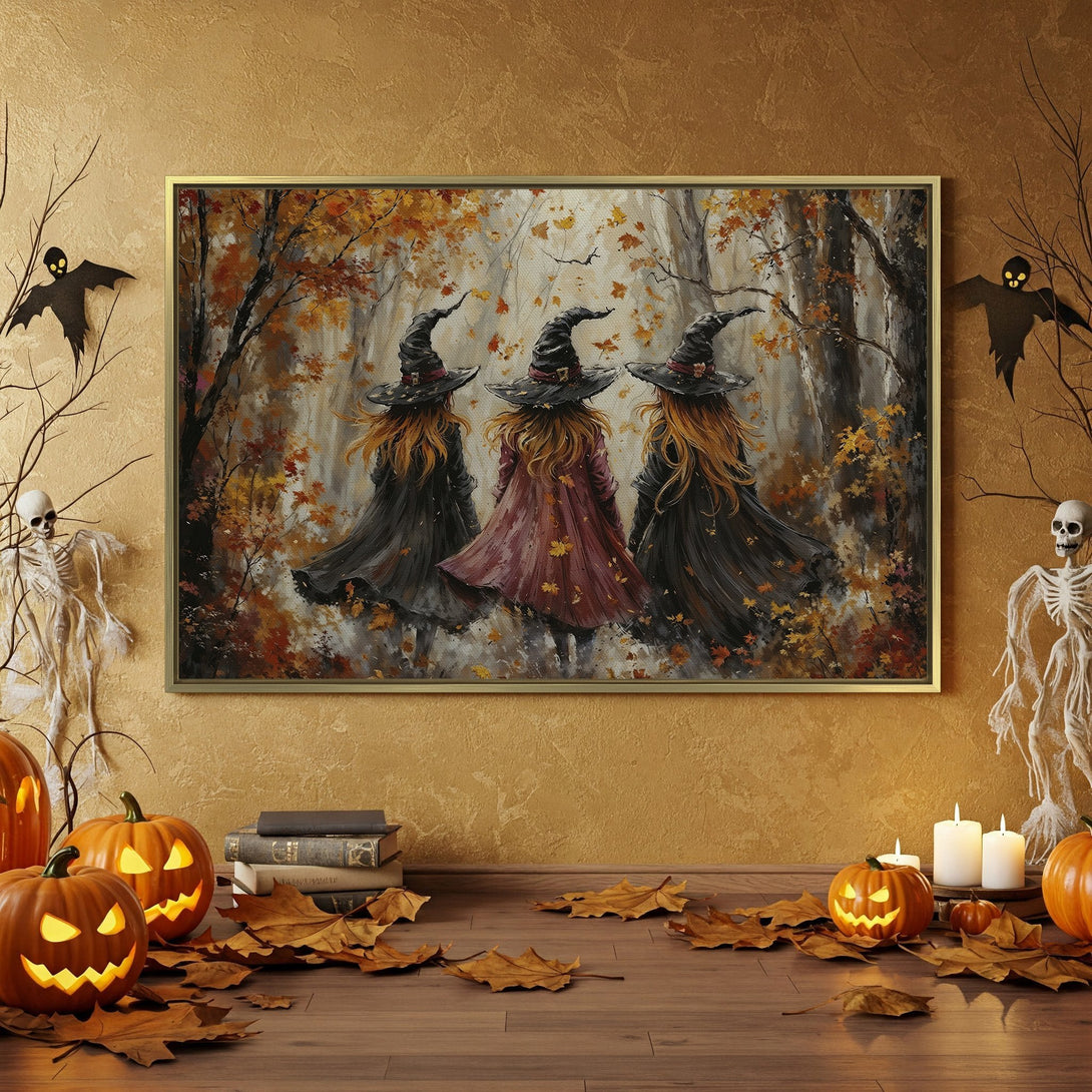 Canvas Print featuring three witches in an autumnal forest, perfect for Halloween decor. Warm orange and black color palette, adding a spooky yet stylish touch.