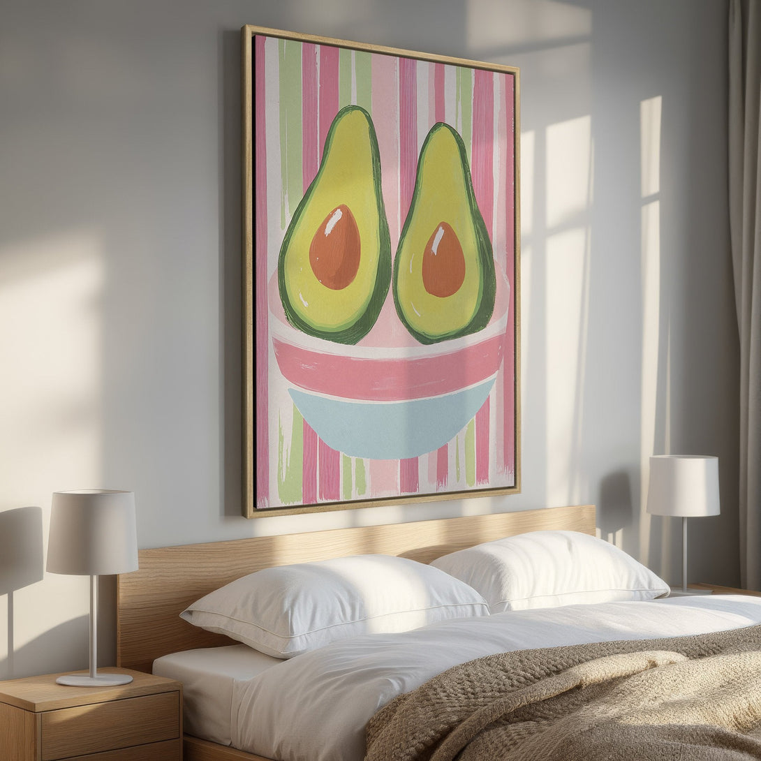 Framed Wall Art: Whimsical avocado print in a bedroom. Playful, colorful artwork with pink, green, and orange hues. Perfect for adding a pop of fun!