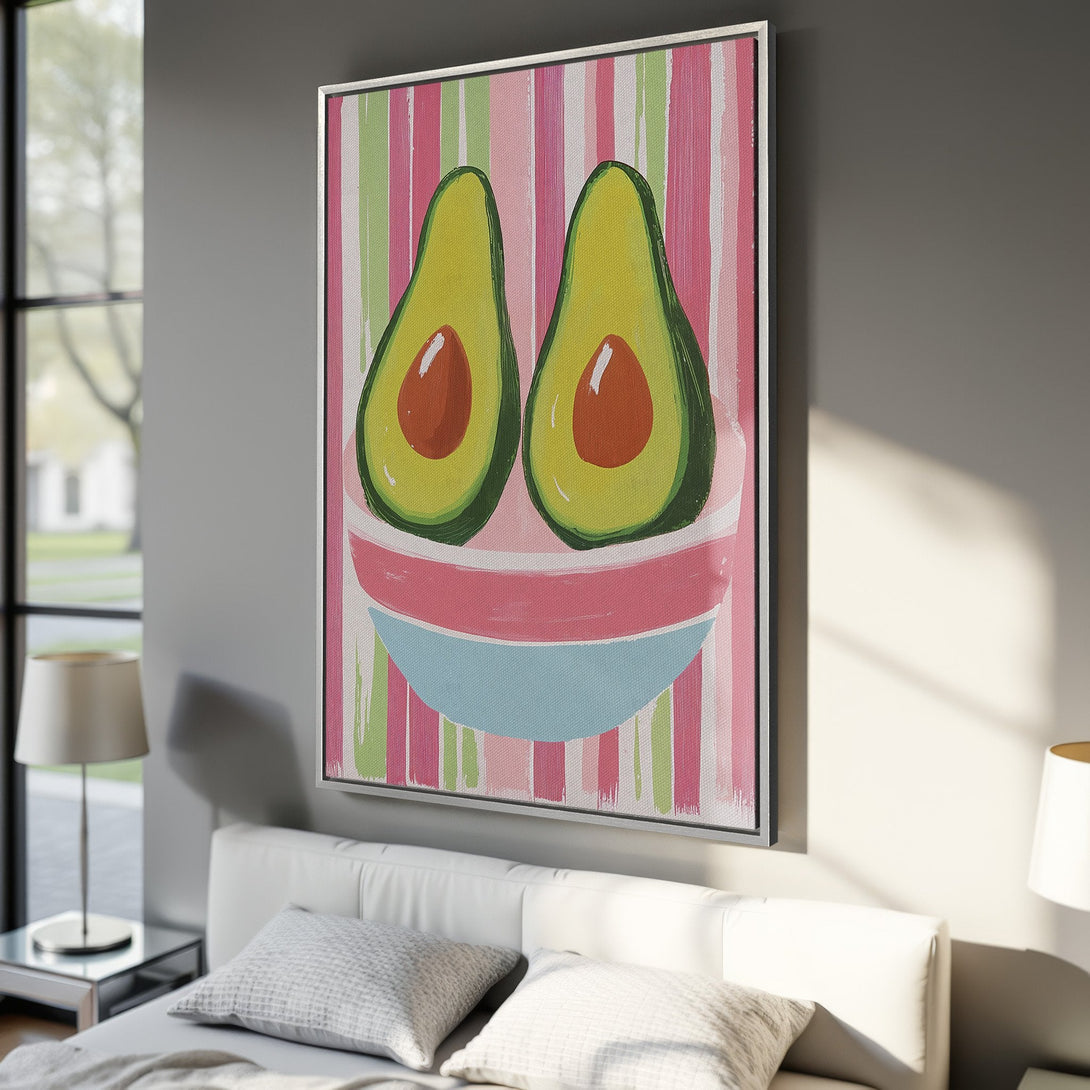 Framed Wall Art: Playful avocado painting with a vibrant pink, green, and blue color palette. Modern art for kitchen or dining room decor.