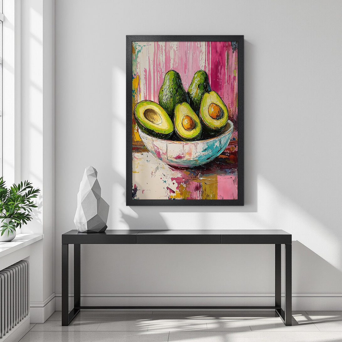 Framed Poster featuring an avocado still life painting. Modern art style with vibrant pink, green, and yellow color palette. Perfect wall decor.