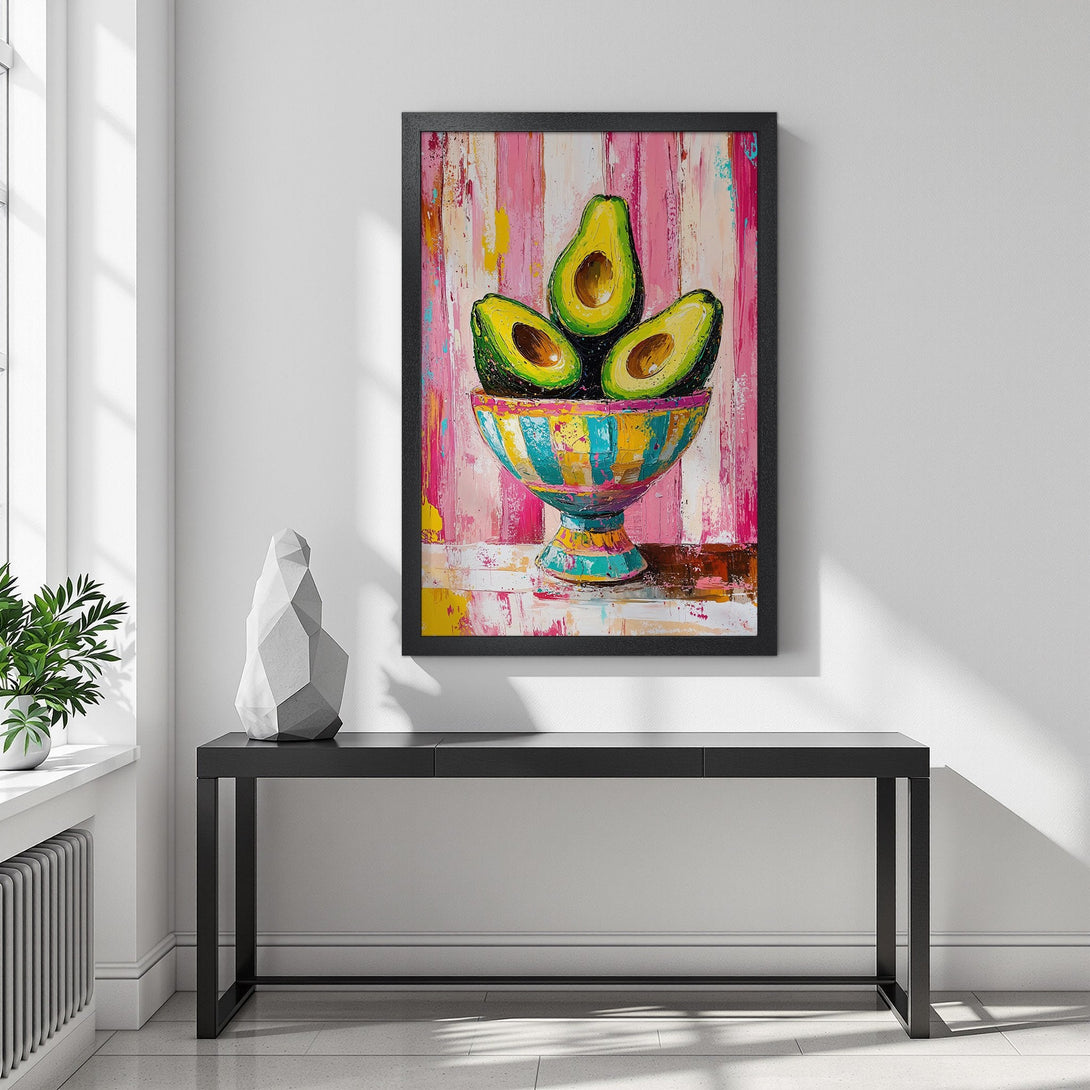 Framed Poster of avocados in a bowl. Modern, colorful art with pink, green, yellow, and blue tones. Perfect kitchen decor.