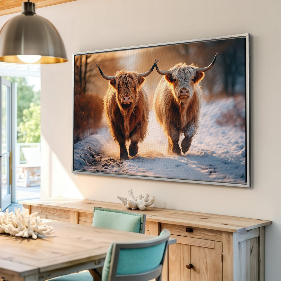 Framed Wall Art featuring two Highland cows in a snowy landscape. Warm, rustic style with a neutral color palette. Perfect for farmhouse decor.