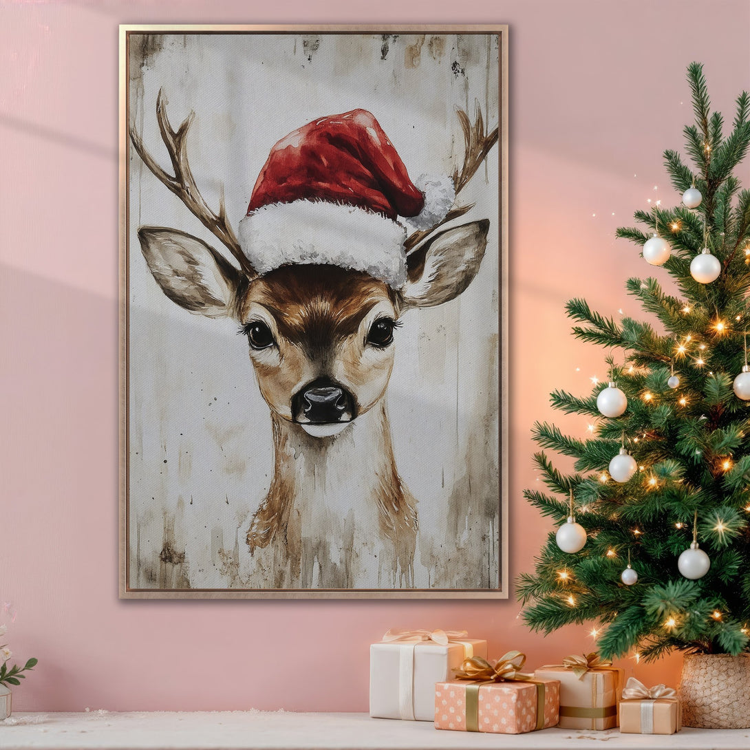 Framed Wall Art: Adorable watercolor deer wearing a Santa hat. Rustic style with warm, earthy tones and a pop of red. Perfect Christmas decor!