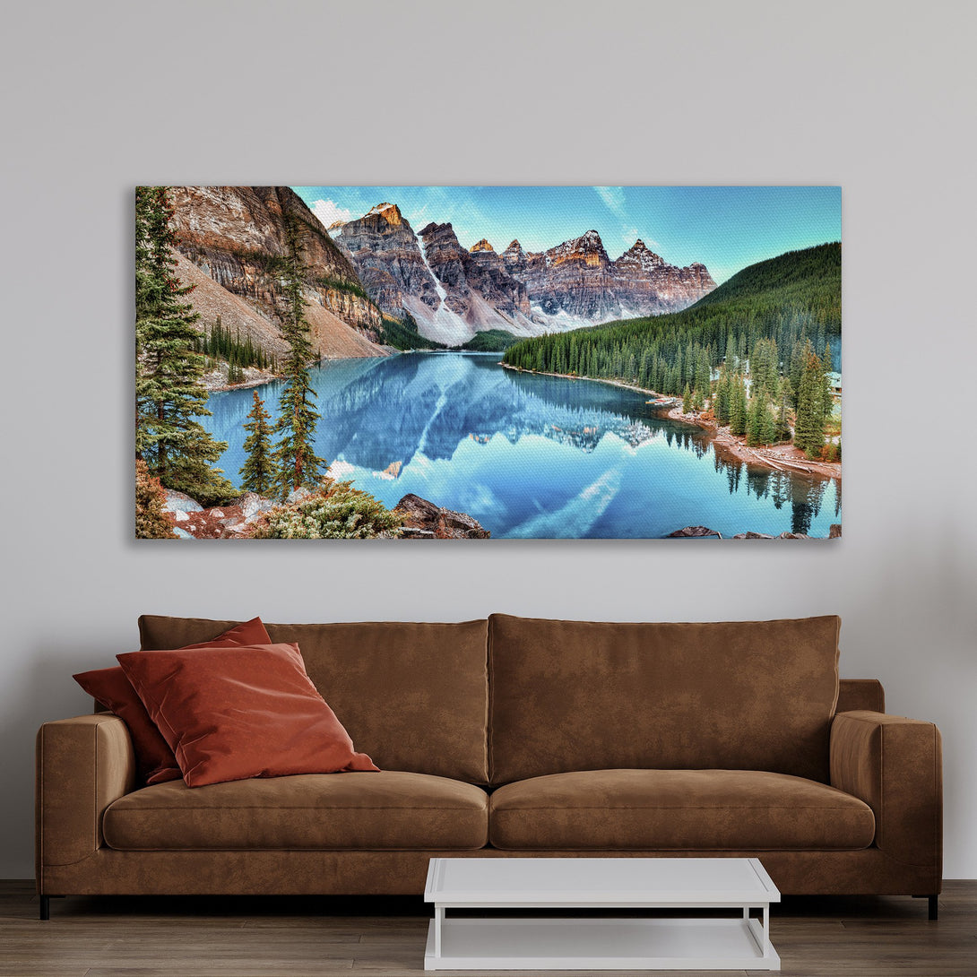 Framed Wall Art of a stunning mountain lake landscape in a modern interior. Blue, green, and brown color palette. Elevate your space with this beautiful art.