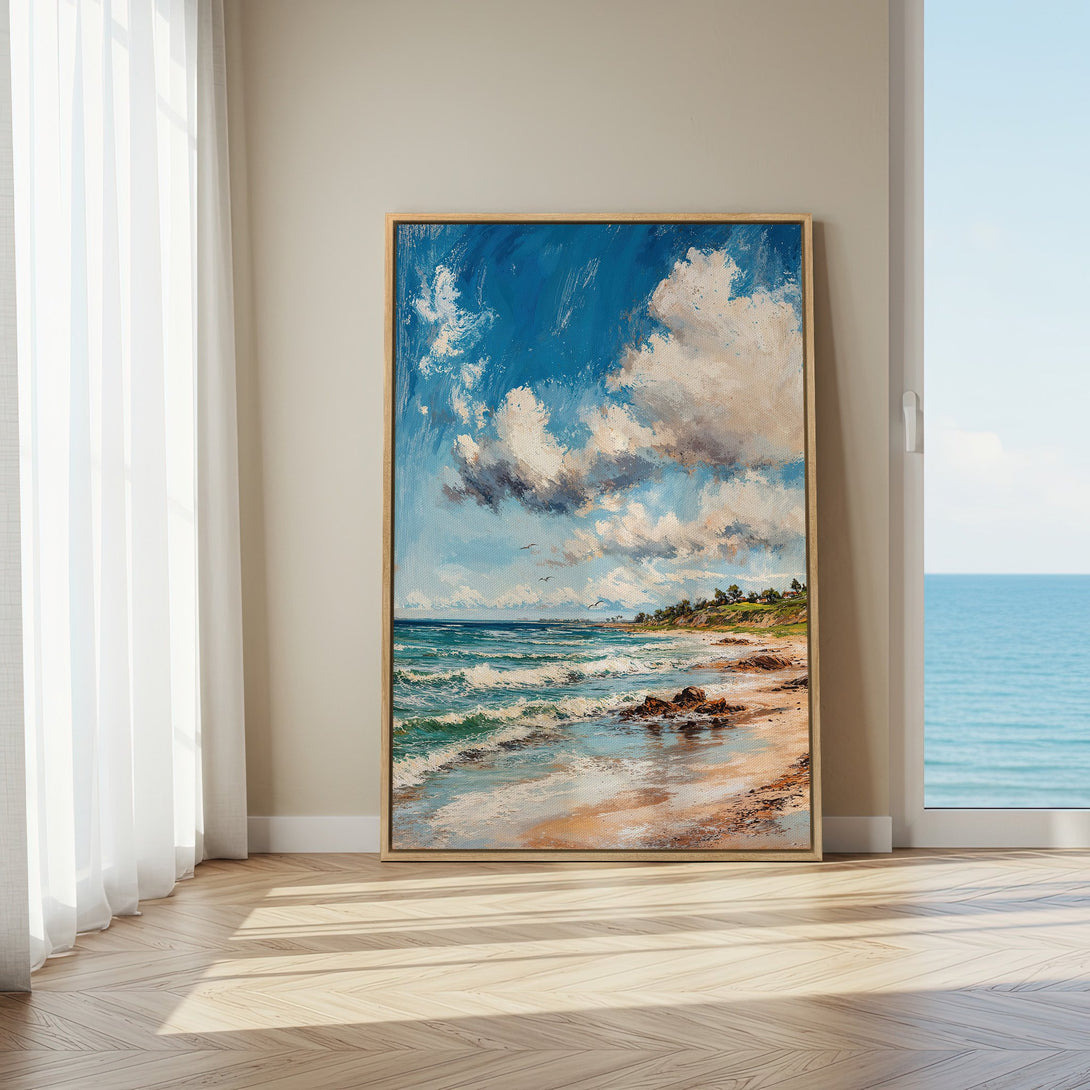 Framed Wall Art: Coastal landscape painting with blue, white, and beige tones. Impressionistic style canvas print adds serene beach vibes to any interior.