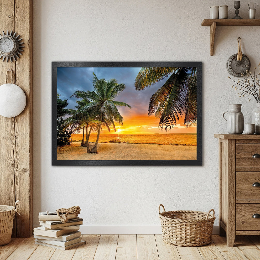 Framed Poster of tropical sunset beach scene with palm trees. Warm orange, yellow, and blue color palette. Coastal decor.