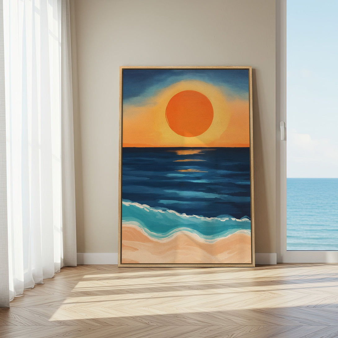 Framed Wall Art Canvas Print of a sunset over the ocean. Coastal style with warm orange, blue, and beige color palette. Perfect for home decor.