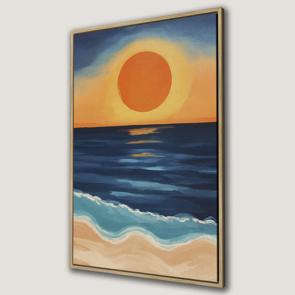 Framed Wall Art of a sunset over the ocean. Coastal painting with warm orange, blue, and beige tones. Perfect for adding a calming touch to your home.