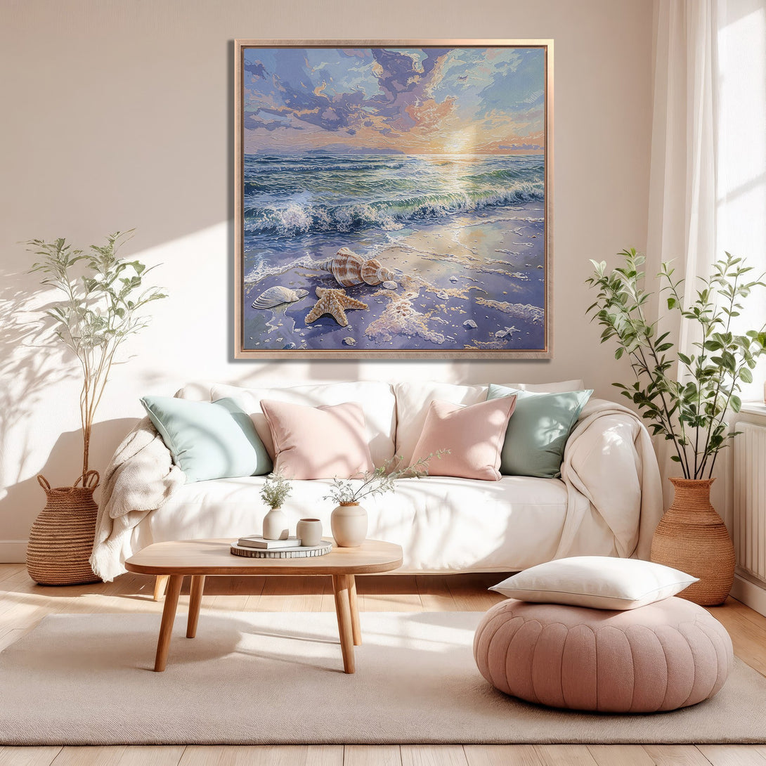 Framed Wall Art of a beach scene with seashells. Coastal style Canvas Print with blue, pink, and gold color palette, perfect for living room decor.