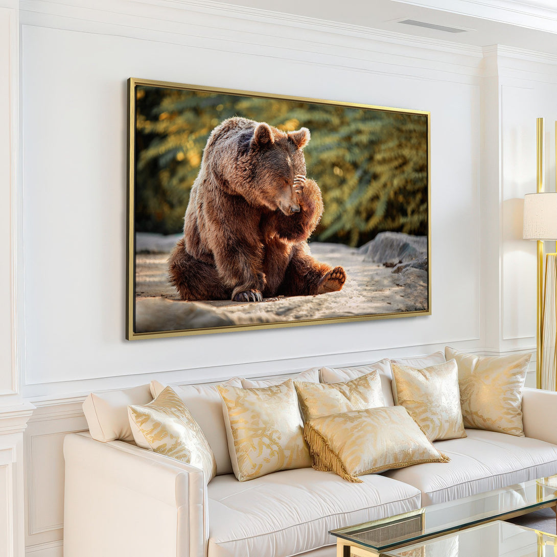 Canvas Print of a brown bear in a natural setting, warm earth tones, displayed in a modern living room. Bring nature indoors!