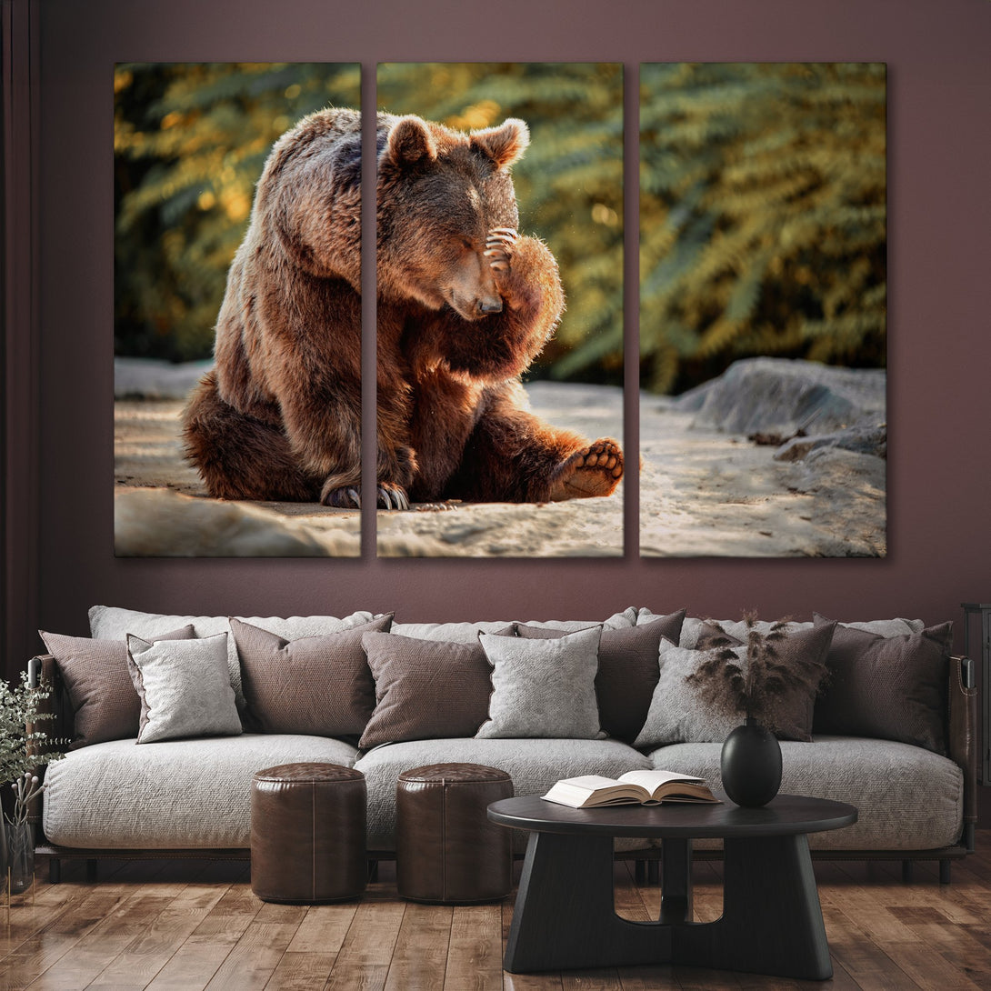 Canvas Print of a brown bear in a natural setting, warm color palette, displayed in a living room. Perfect nature-themed wall art.
