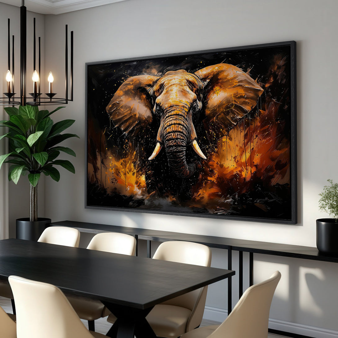 Framed Wall Art: Bold elephant portrait in warm orange and black tones. Modern, abstract style Canvas Print adds a striking focal point to any room.
