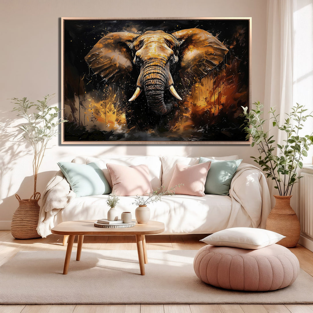 Framed Wall Art featuring an elephant in a modern, abstract style with a striking black and gold color palette. Perfect for adding a bold statement to any room.