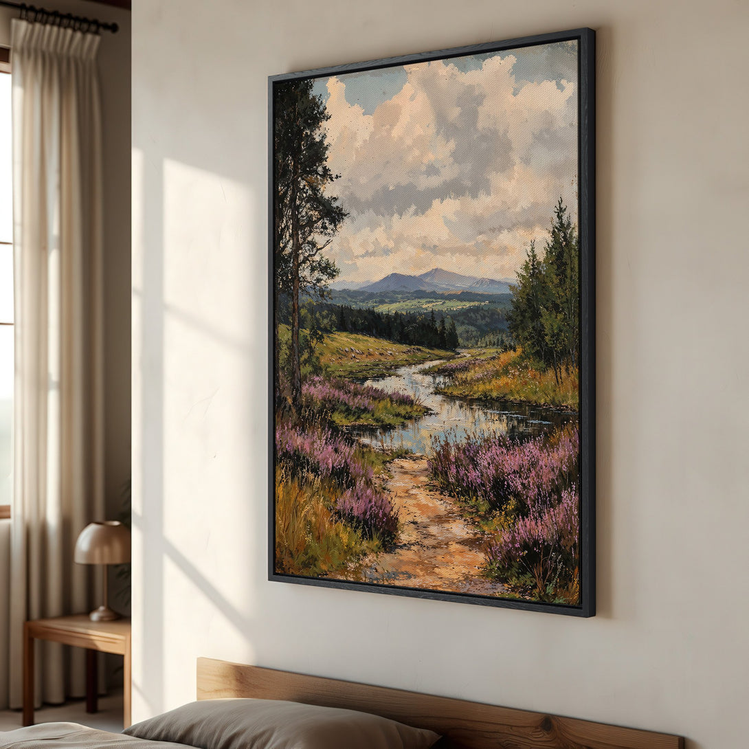 Framed Wall Art: Landscape Canvas Print with a serene river scene, featuring a path, mountains, and purple flowers. Warm earth tones and cool blues.