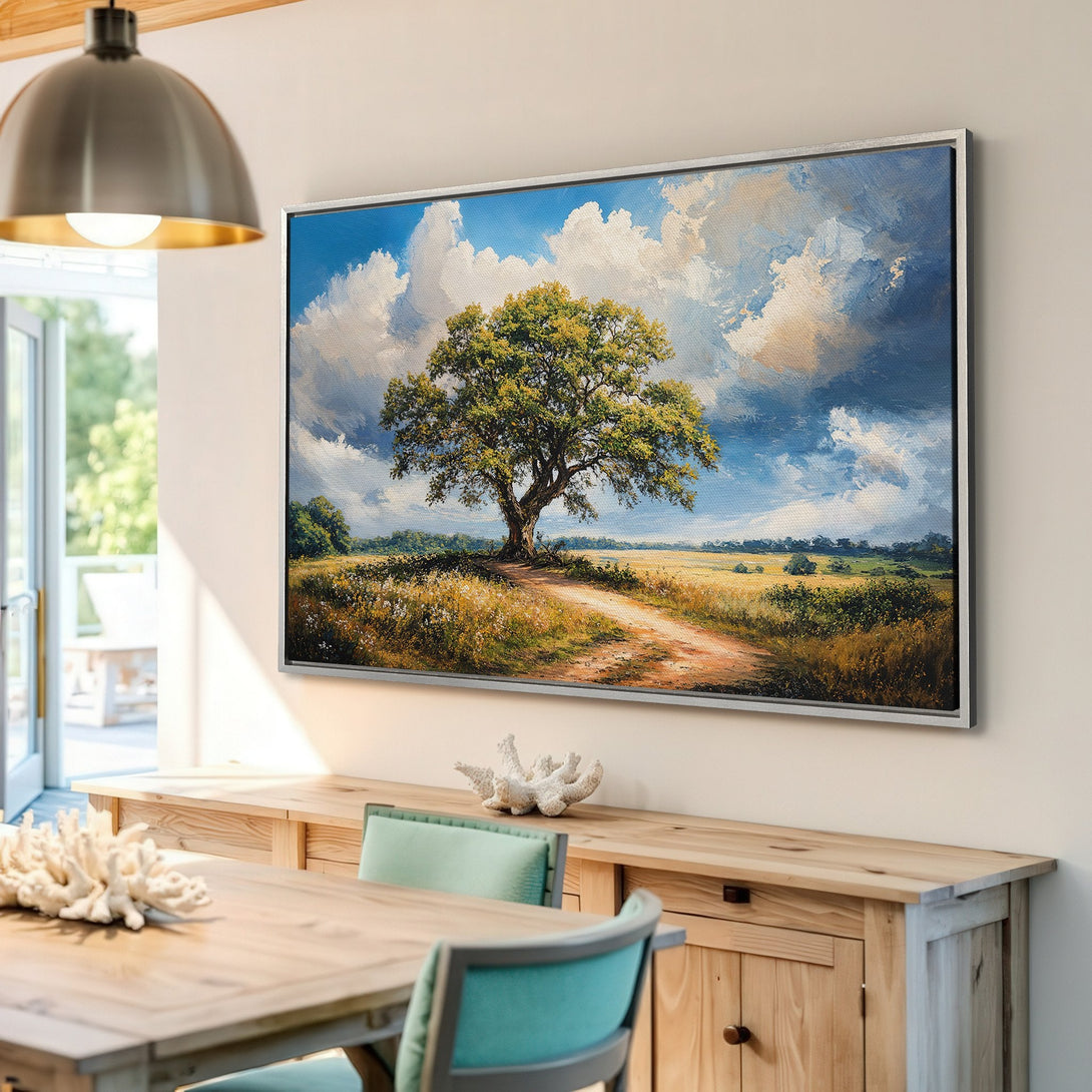 Framed Wall Art: Landscape canvas print of a tree in a field, with blue, green, and yellow color palette, perfect for home decor.