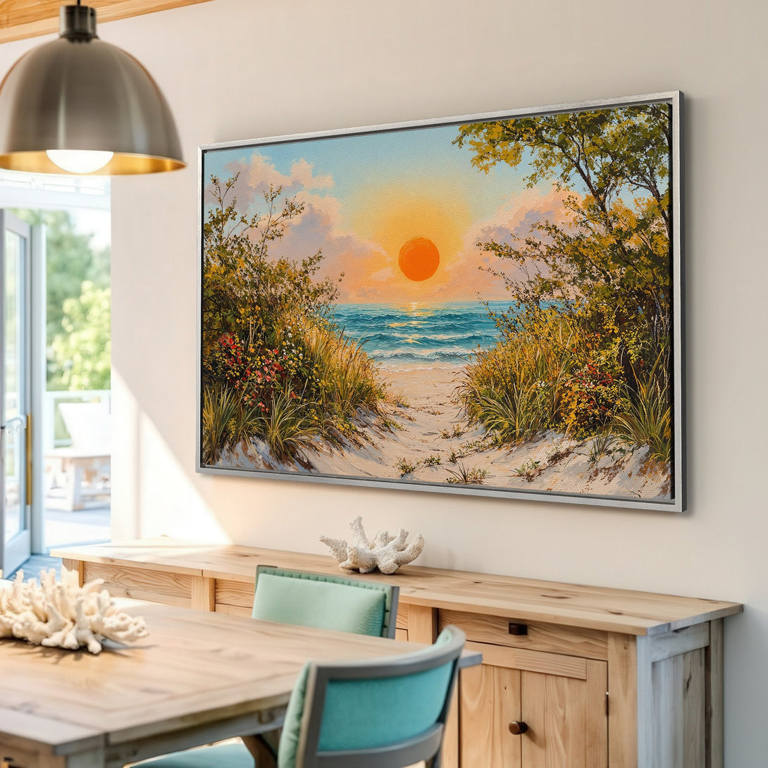 Framed Wall Art: Coastal sunset canvas print in warm tones. Beach scene art with orange, blue, and green palette. Perfect for adding a touch of serenity to your home.