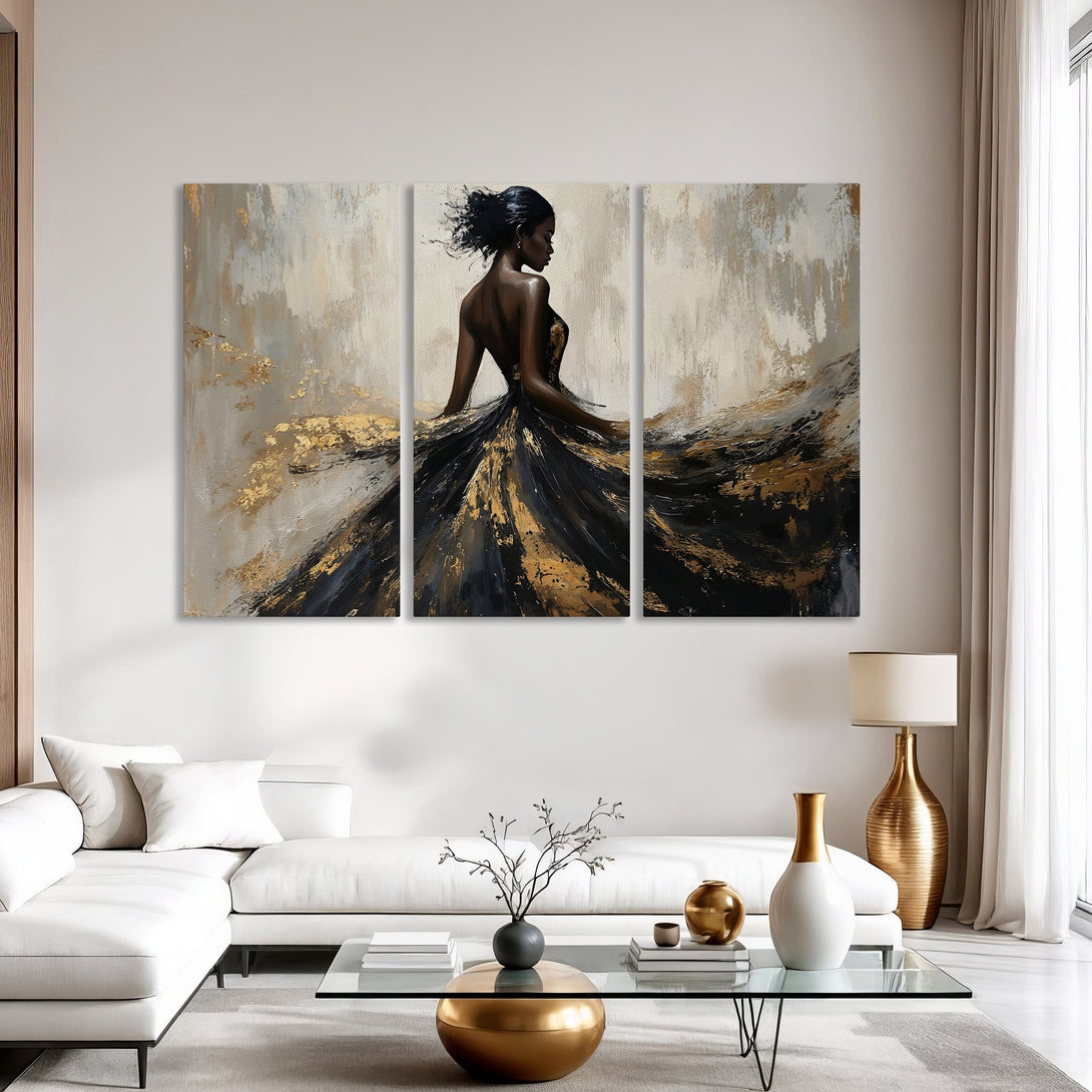 Canvas Print of a woman in a black and gold dress, abstract art style. Elegant wall decor with neutral and gold color palette, perfect for any space.