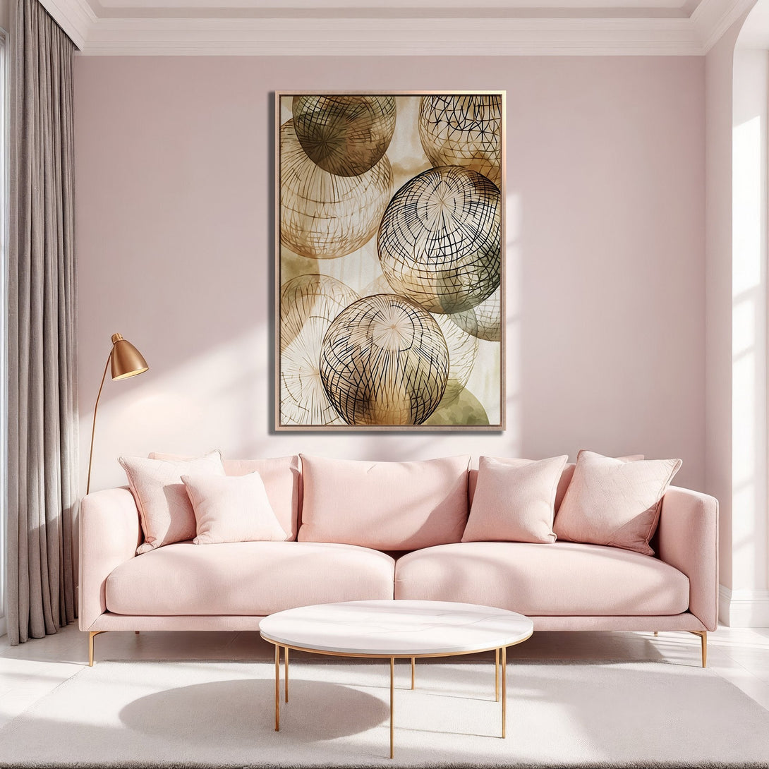 Framed Wall Art featuring abstract geometric spheres in neutral tones. Modern art in a blush pink living room, perfect for adding a touch of elegance.