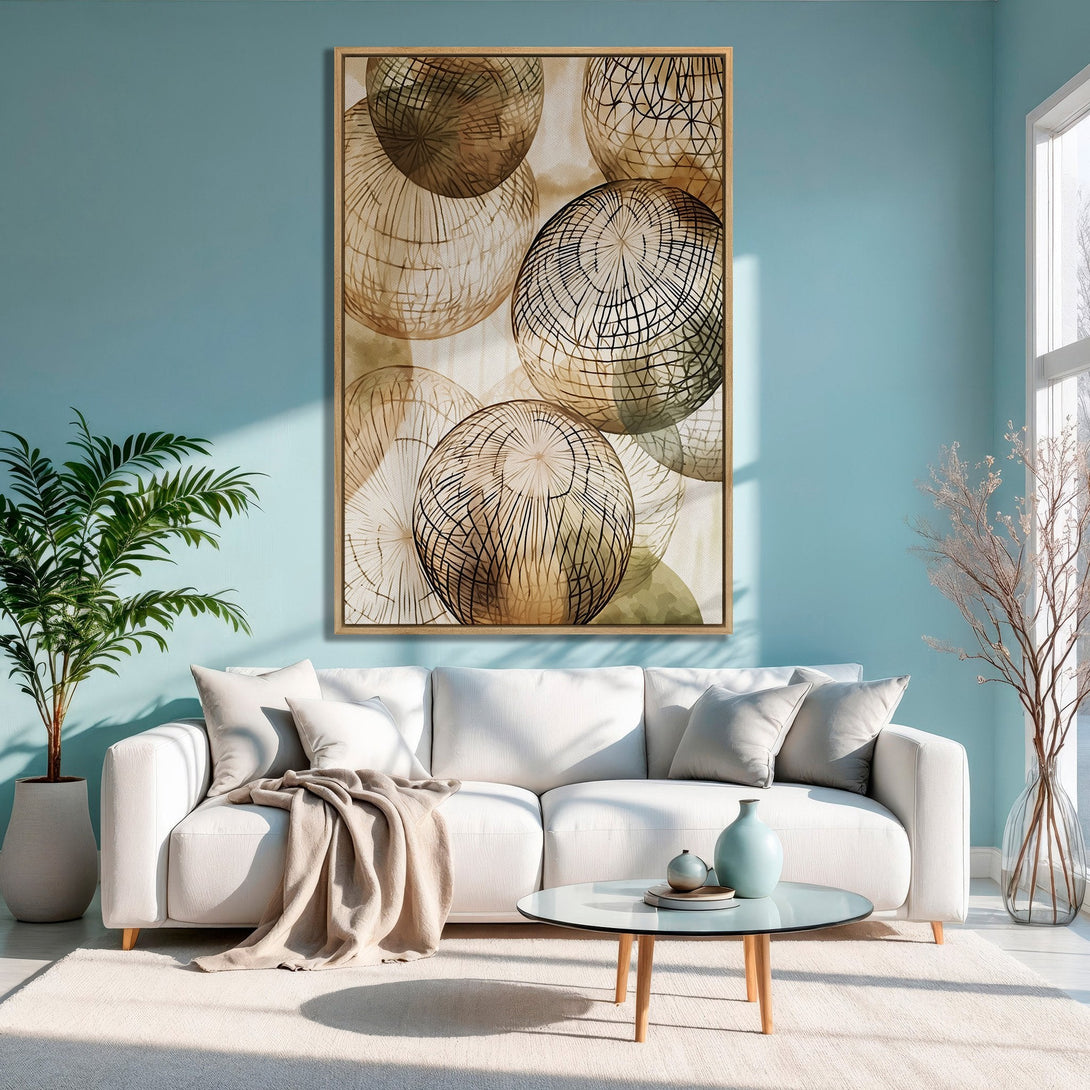 Framed Wall Art featuring abstract geometric spheres in neutral tones. Stylish decor for any living room. Earthy color palette complements modern interior design.