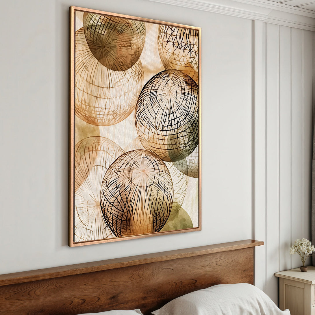 Framed Wall Art featuring abstract sphere design in warm neutral tones. Modern art for bedroom decor. Canvas print with a gold frame.