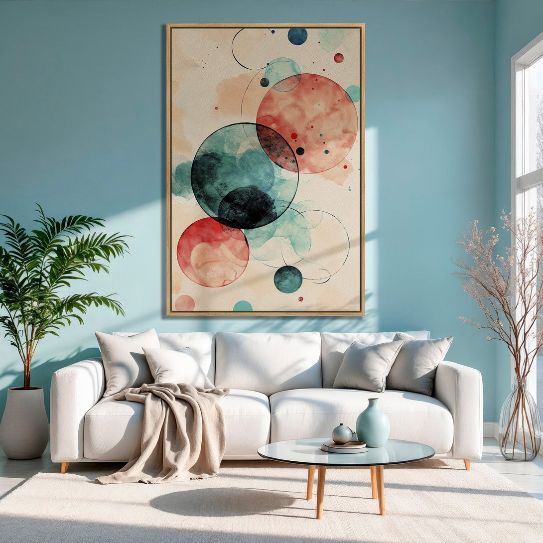 Framed Wall Art featuring abstract watercolor circles in red, teal, and beige. Modern art for living room decor, adding a pop of color.