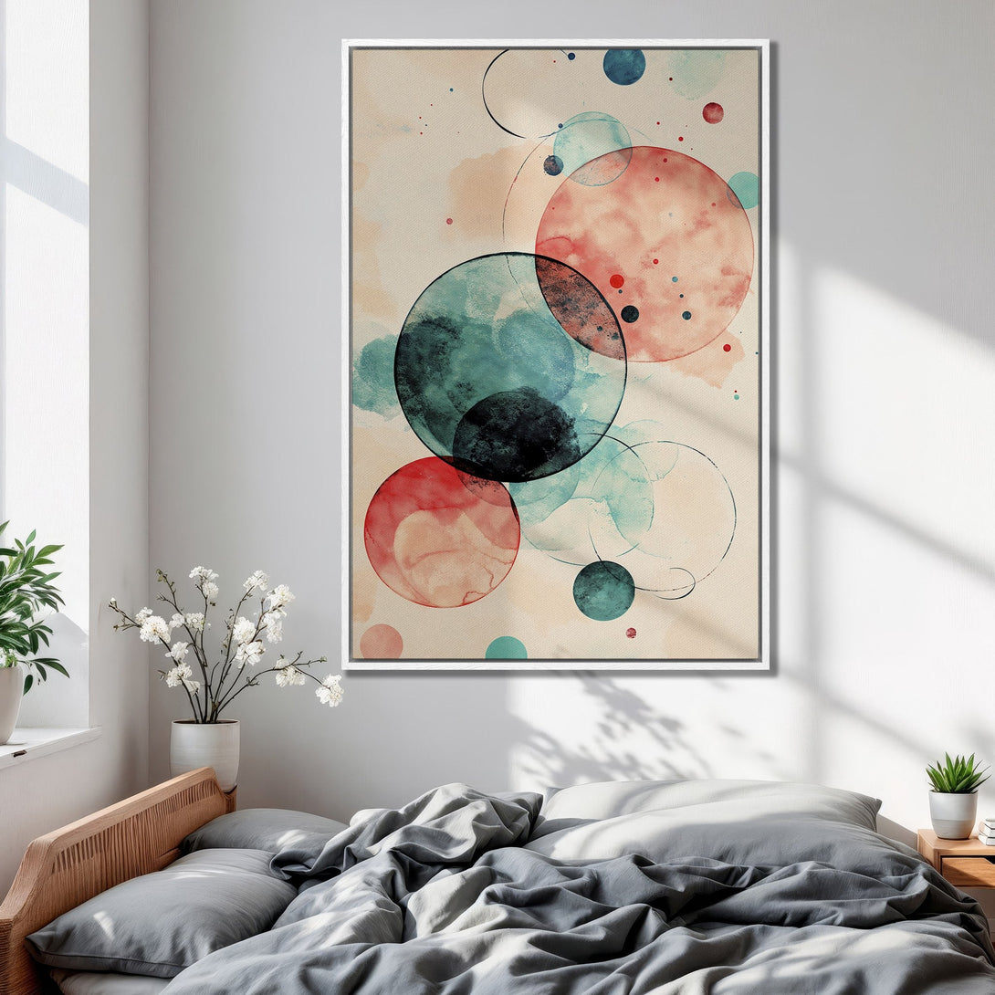 Framed Wall Art featuring abstract watercolor circles in teal, red, and beige. Modern art for bedroom decor. Shop our Canvas Print collection today!