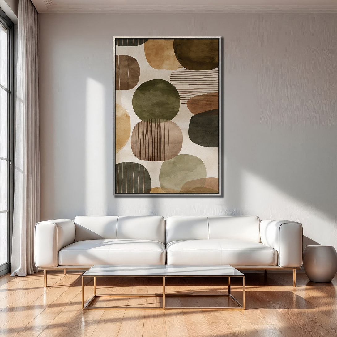 Framed Wall Art featuring abstract earth-tone shapes. Modern art canvas print adds a touch of elegance to any interior. Warm, neutral color palette.