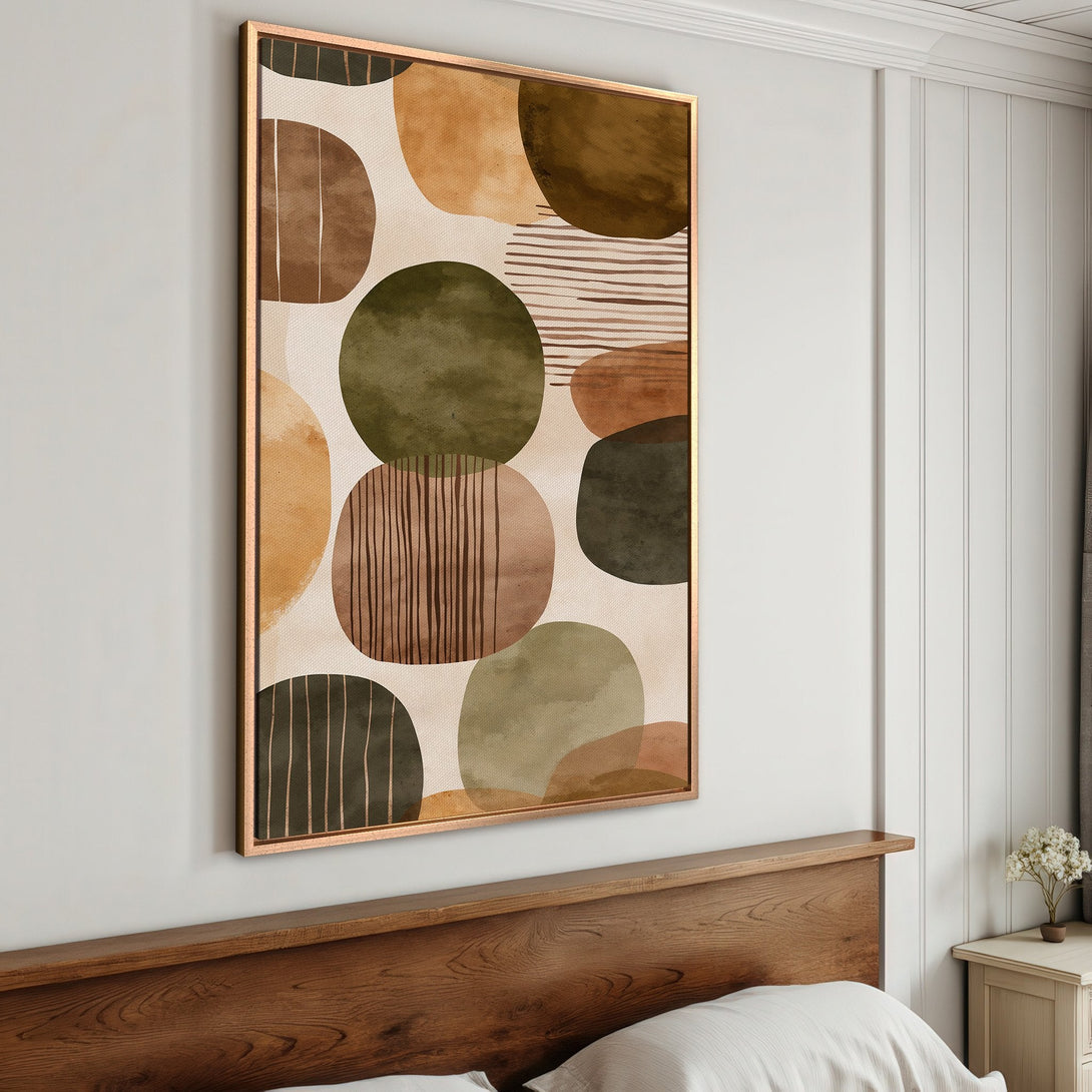 Framed Wall Art featuring abstract shapes in earthy tones. Modern canvas print adds a touch of warmth and style to any bedroom decor.
