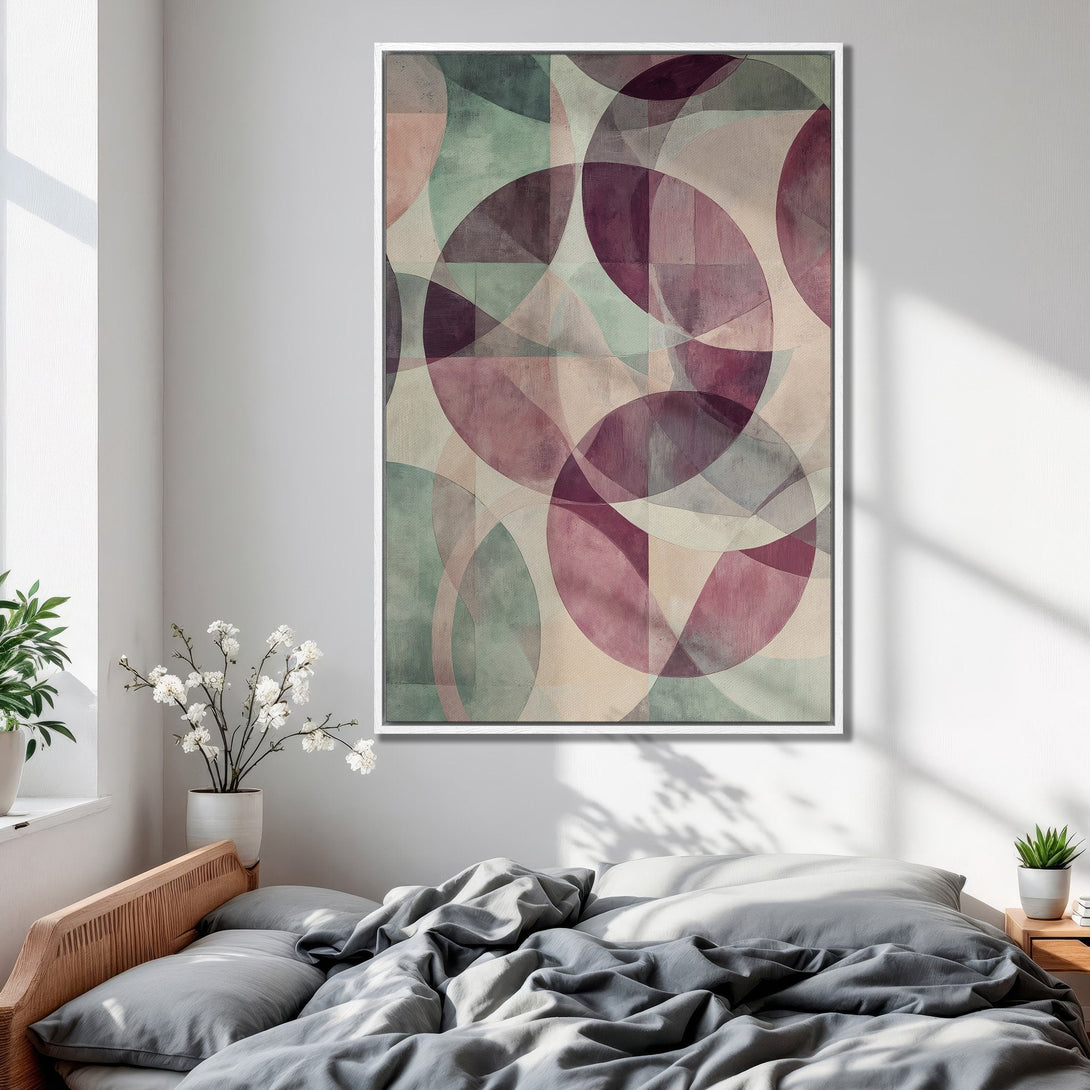 Framed Wall Art featuring an abstract geometric design in a muted color palette of pink, green, and beige. Perfect for bedroom decor!