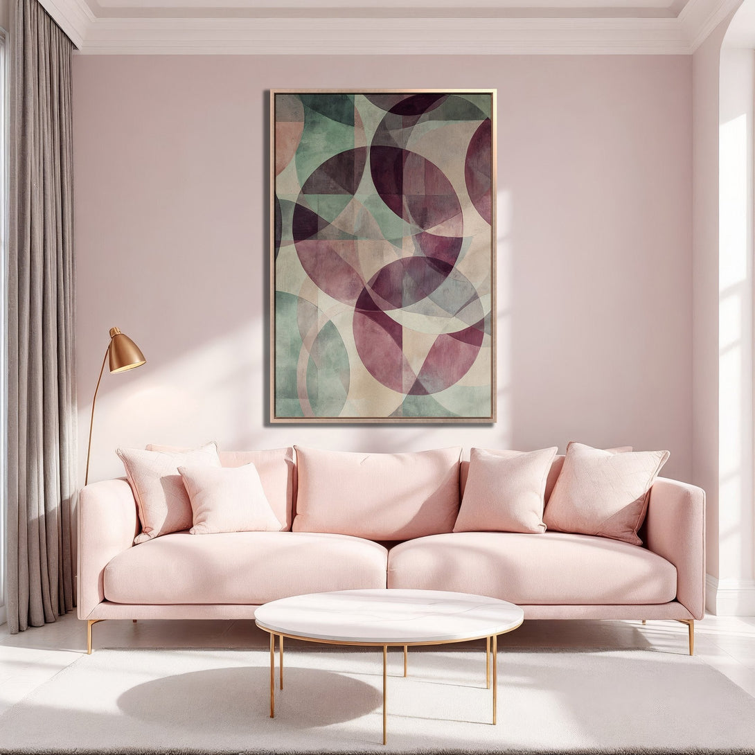 Framed Wall Art featuring abstract geometric design in blush, green, and purple tones. Modern Canvas Print adds a touch of elegance to any living room.