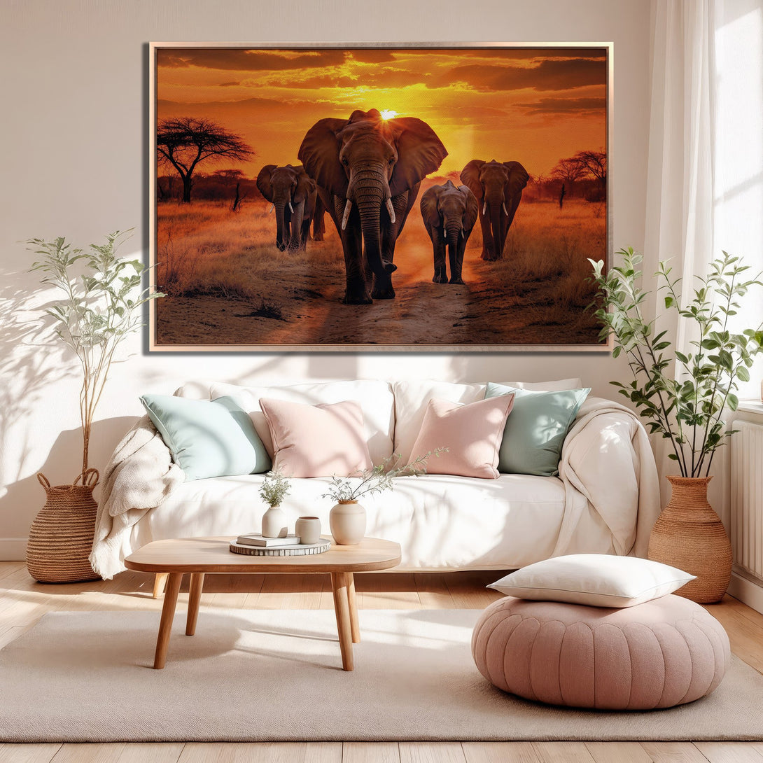 Framed Wall Art featuring majestic elephants in a vibrant sunset scene. Warm orange and brown tones create a stunning African savanna aesthetic. Perfect for adding drama!