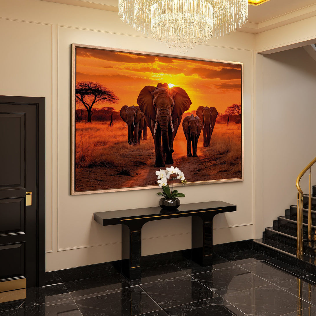 Framed Wall Art: Majestic elephants at sunset. Warm orange and brown tones create a stunning African landscape. Elevate your space with this beautiful artwork.