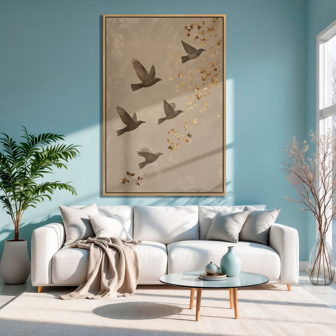 Framed Wall Art featuring birds in flight, neutral tones, and gold accents. Perfect for adding a touch of nature and elegance to your living room.