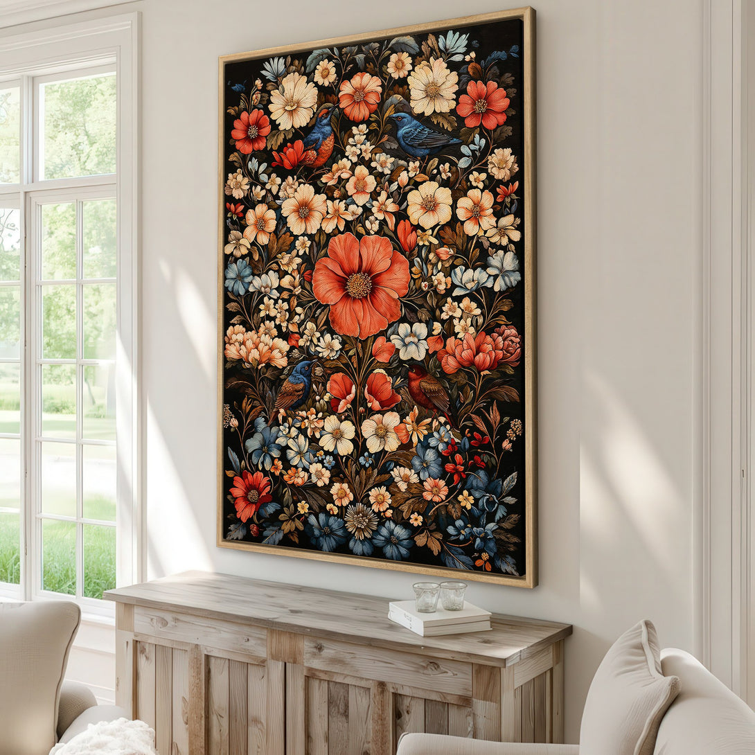 Framed Wall Art featuring a vibrant floral design with birds, in warm orange, blue, and cream tones, perfect for adding a touch of nature to your home decor.