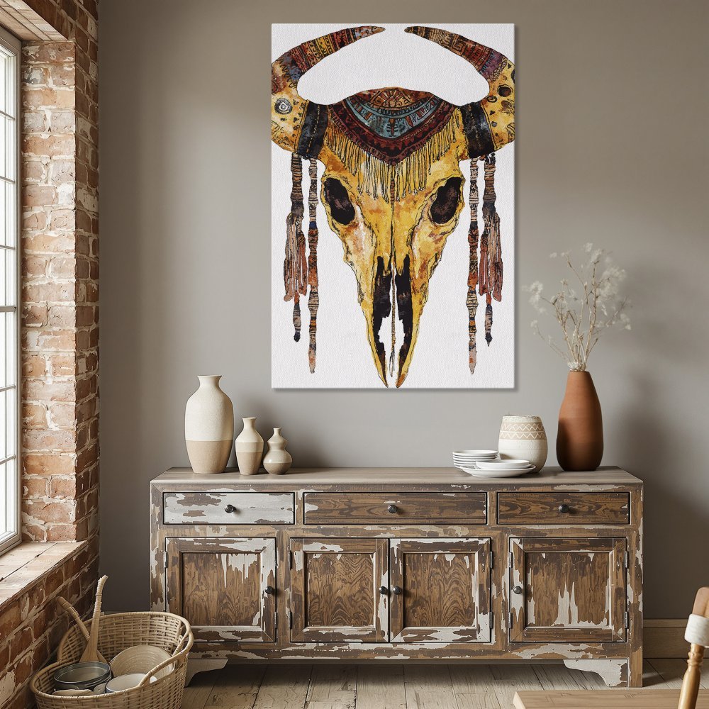 Framed Wall Art: Watercolor skull print in warm yellow and brown tones. Boho-chic style, perfect for dining room decor.