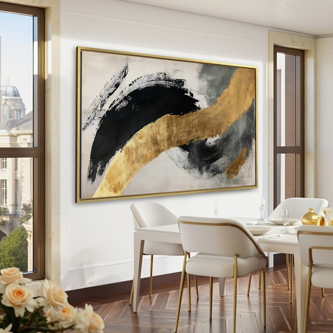 Abstract Canvas Print in a luxurious interior. Features bold black and gold strokes on a neutral background, perfect for modern decor.